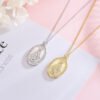 Virgin Mary sweater necklace